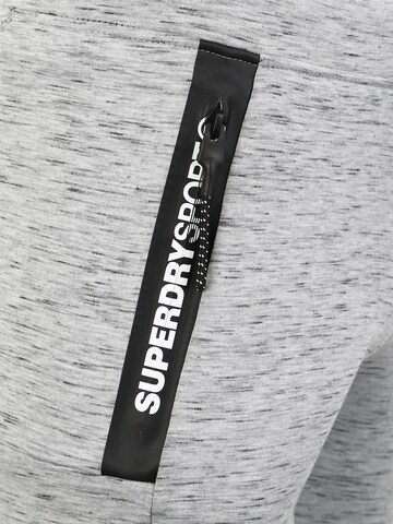 Superdry Voľný strih Športové nohavice - Sivá