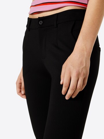 SISTERS POINT Slim fit Trousers in Black