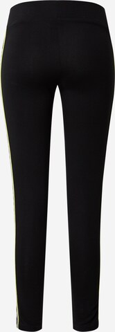 Skinny Leggings de la Karl Kani pe negru