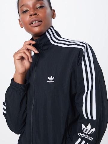 ADIDAS ORIGINALS Jacke 'Lock up it' in Schwarz