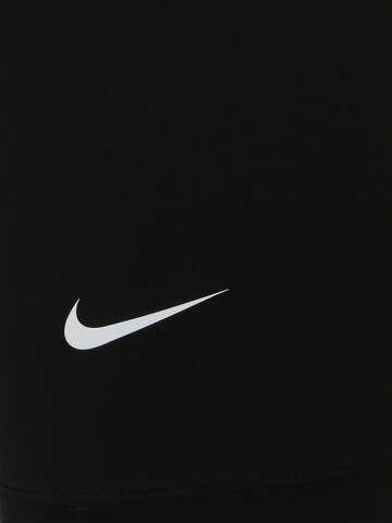 NIKE Skinny Sports trousers in Black