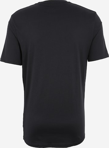 UNDER ARMOUR - Camiseta funcional 'GL Foundation' en negro: atrás