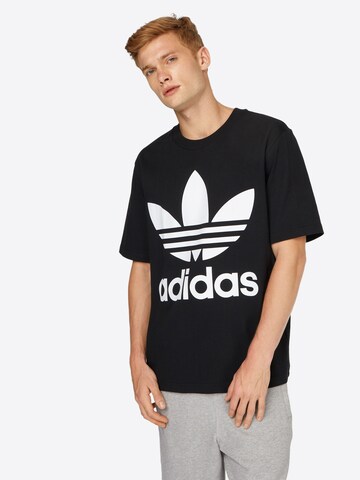 T-Shirt 'Trefoil' ADIDAS ORIGINALS en noir : devant