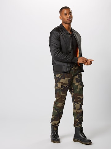 Effilé Pantalon cargo Urban Classics en vert