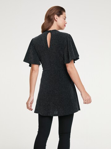 heine - Blusa en negro: atrás