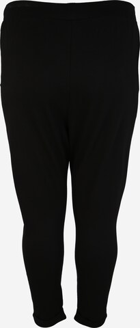 Tapered Pantaloni 'Terry' di Urban Classics in nero