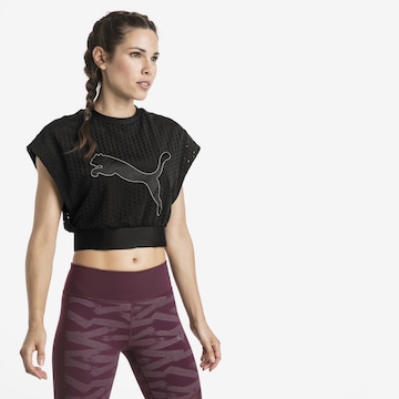 PUMA Funkční tričko 'Luxe' – černá: přední strana
