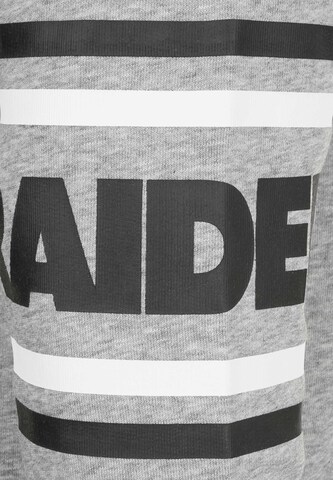 Sweat-shirt 'NFL Badge Oakland Raiders' NEW ERA en gris