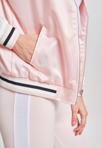 Veste mi-saison Urban Classics en rose