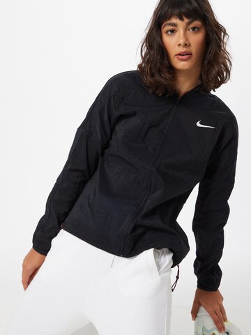 NIKE Athletic Jacket 'Icon Clash' in Black: front