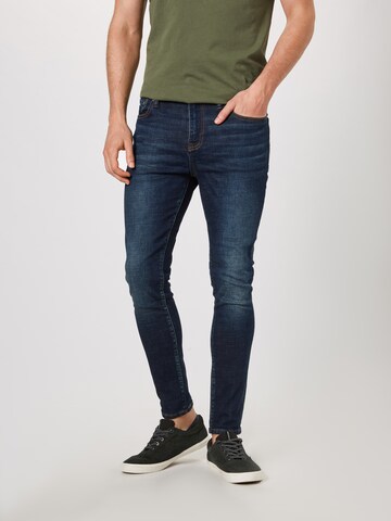 Skinny Jeans 'Travis' de la Superdry pe albastru