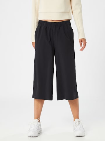 UNDER ARMOUR Wide leg Sports trousers in Black: front
