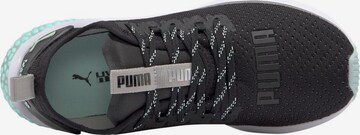 Chaussure de course 'Hybrid Nx Tz' PUMA en noir