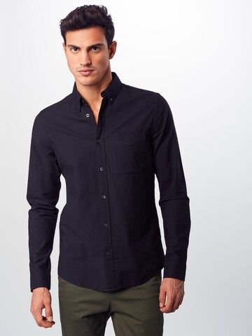 Coupe slim Chemise Calvin Klein Jeans en noir : devant