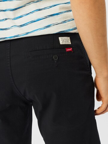 LEVI'S ® Avsmalnet Chinobukse 'XX Chino Shorts' i svart