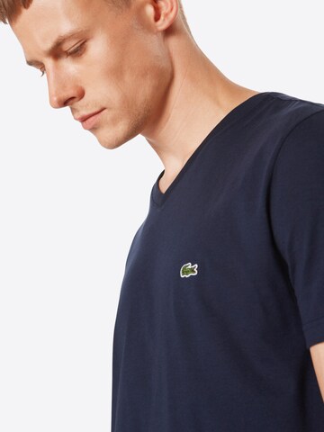 LACOSTE T-shirt i blå