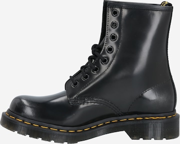 juoda Dr. Martens Suvarstomieji kulkšnis dengiantys batai