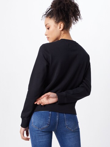Calvin Klein Jeans Sweatshirt in Schwarz: zadná strana