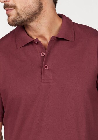 Man's World Poloshirt in Rot