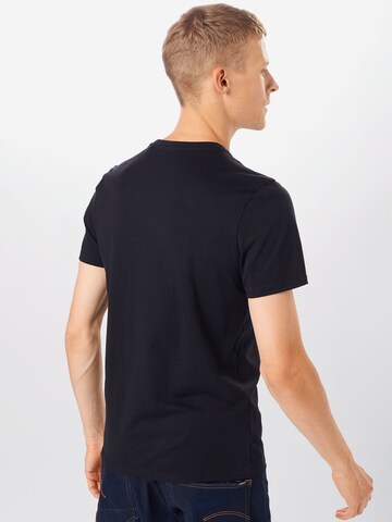 GUESS T-Shirt 'Multitude' in Schwarz