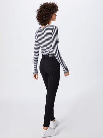 VERO MODA Skinny Spodnie 'Hot' w kolorze czarny