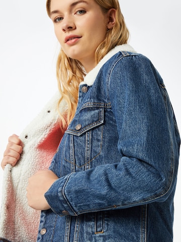 LEVI'S ® Between-season jacket 'Ex BF Sherpa Trucker' in Blue