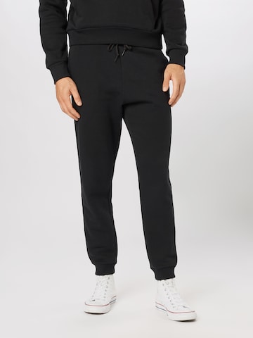 CONVERSE Spodnie w kolorze czarny: przód