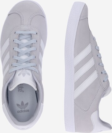 ADIDAS ORIGINALS Tennarit 'GAZELLE J' värissä harmaa