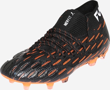 Chaussure de foot PUMA en noir : devant