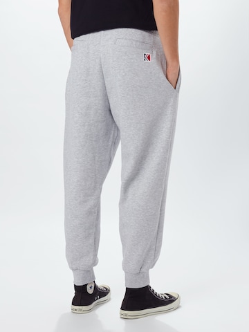 Karl Kani Tapered Trousers in Grey