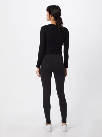 Champion Authentic Athletic Apparel Skinny Leggings in Schwarz: Rückseite