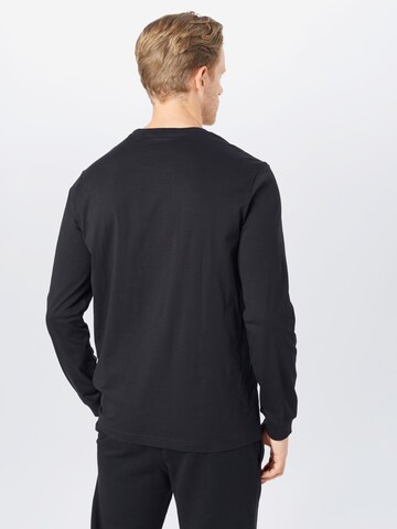 Champion Authentic Athletic Apparel Regularny krój Koszulka w kolorze czarny