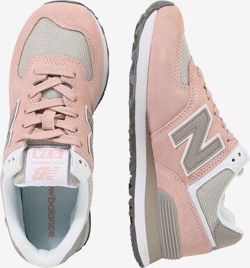 Baskets basses 'WL574' new balance en rose : sur le côté