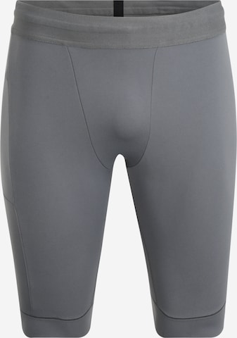 NIKE Skinny Sportbroek 'Nike Yoga Dri-FIT' in Grijs: voorkant