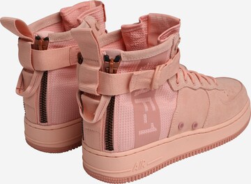 Baskets hautes Nike Sportswear en rose : derrière
