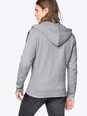 TOMMY HILFIGER - Sudadera con cremallera en gris