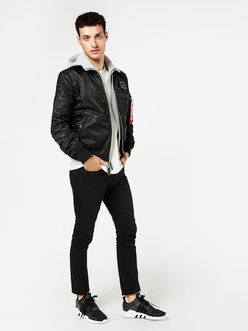 ALPHA INDUSTRIES Between-Season Jacket 'MA-1 D-Tec' in Black