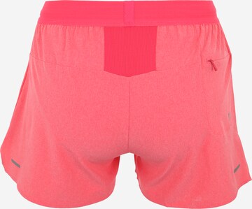 ASICS Normalny krój Spodnie sportowe w kolorze różowy: tył