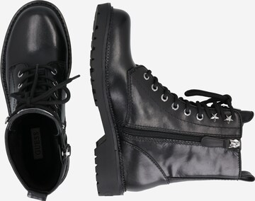 GUESS - Botines con cordones en negro