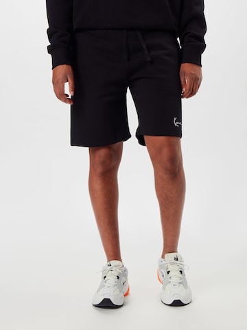 Karl Kani Regular Trousers in Black: front