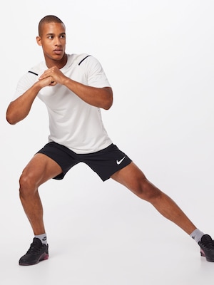 NIKE Sportshorts in schwarz / weiß