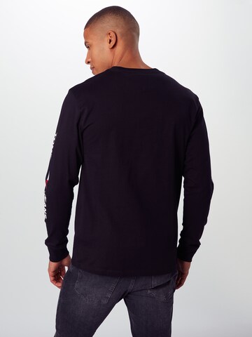 T-Shirt Tommy Jeans en noir : derrière