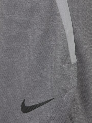 NIKE Normální Sportovní kalhoty – šedá