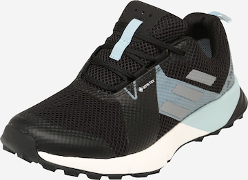 Chaussure de course ADIDAS TERREX en noir : devant