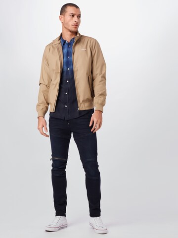 Schott NYC Regular fit Between-Season Jacket 'BLOUSON CABL BRODERIE POITRINE SCHO' in Beige