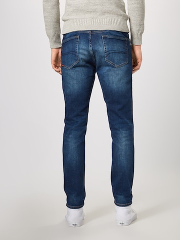 Slimfit Jeans 'Tyler' de la Superdry pe albastru: spate