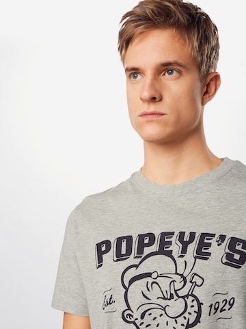 Merchcode Shirt 'Popeye Barber Shop' in Grau