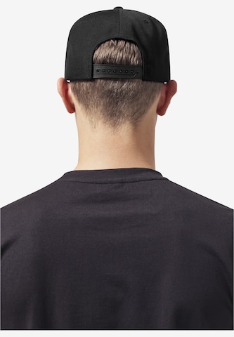 Cappello da baseball 'Metallic Visor' di Flexfit in nero