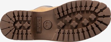 TIMBERLAND Μπότες με κορδόνια σε κίτρινο