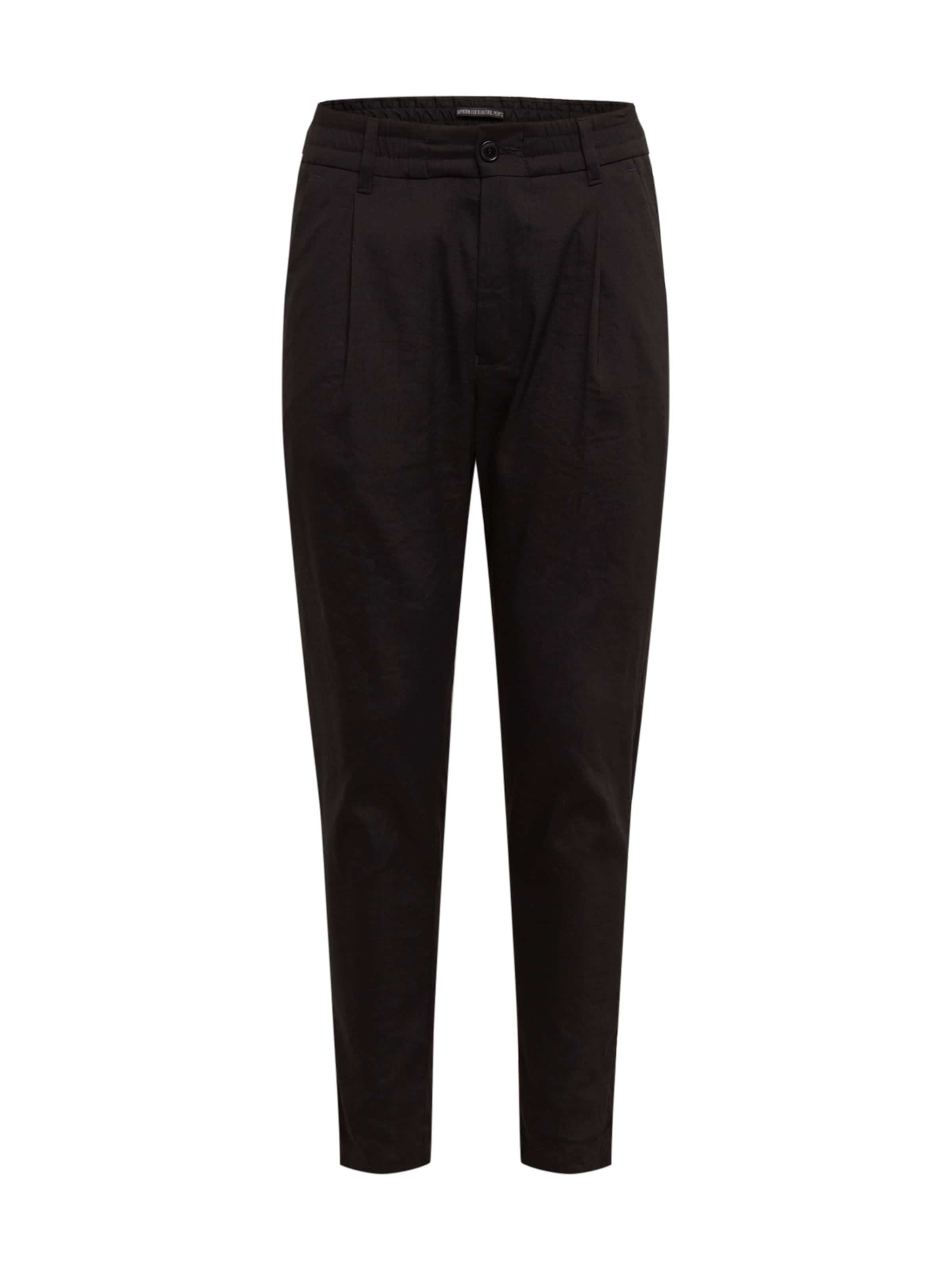 DRYKORN Loose fit Pleat-Front Pants 'CHASY' in Black: front